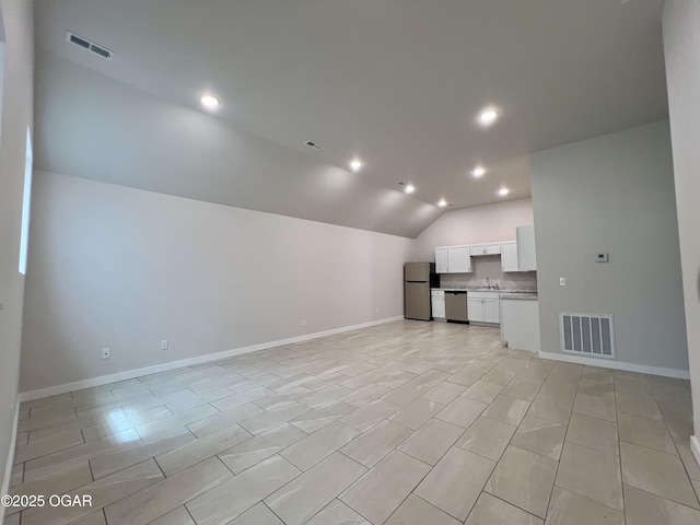 204 Webb St, Duenweg, MO 64841 - unfurnished living room featuring vaulted ceiling, a sink, baseboards, and recessed lighting