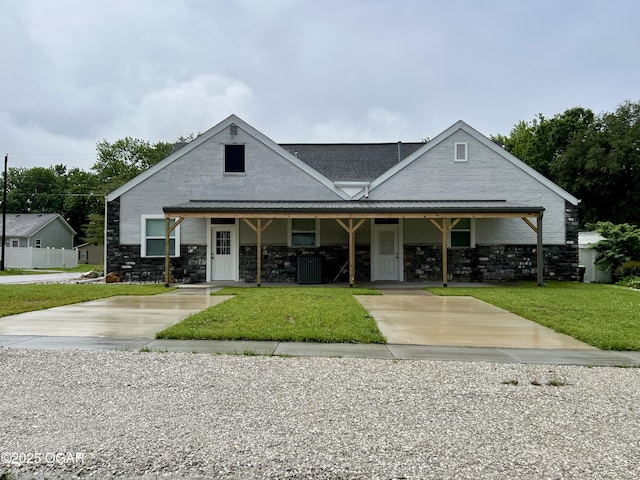 204 Webb St, Duenweg, MO 64841 - view of front of home with covered porch, stone siding, and cooling unit