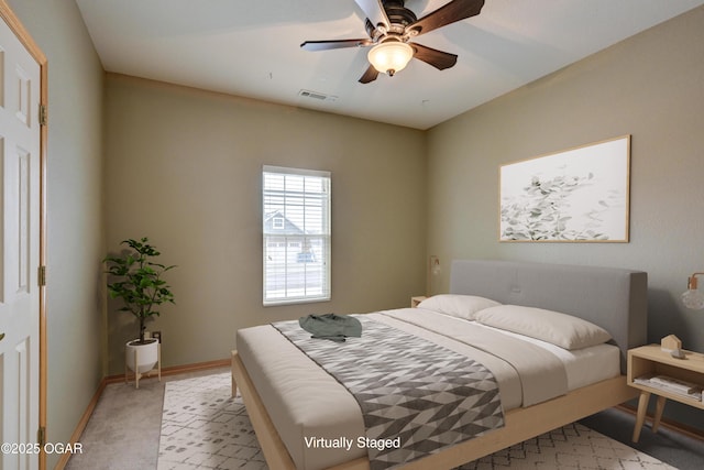 4320 Wisteria Way, Joplin, MO 64801 - bedroom with light carpet, baseboards, and a ceiling fan