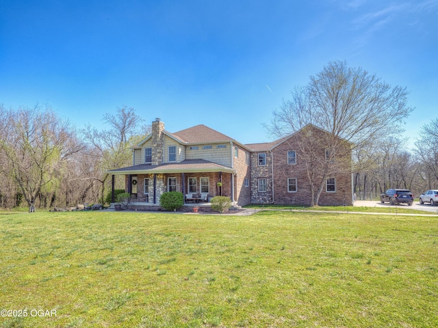 1761 N E St, Webb City, MO 64870 - view of front of home with a porch, a chimney, a front yard, and brick siding