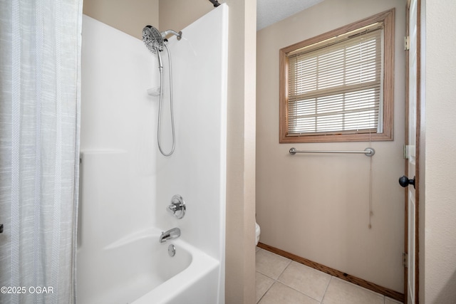 330 Sadie Ln, Webb City, MO 64870 - bathroom featuring toilet, shower / bathtub combination with curtain, tile patterned flooring, and baseboards
