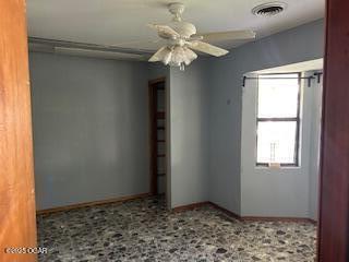 105 N Pearl Ave, Joplin, MO 64801 - unfurnished room featuring baseboards