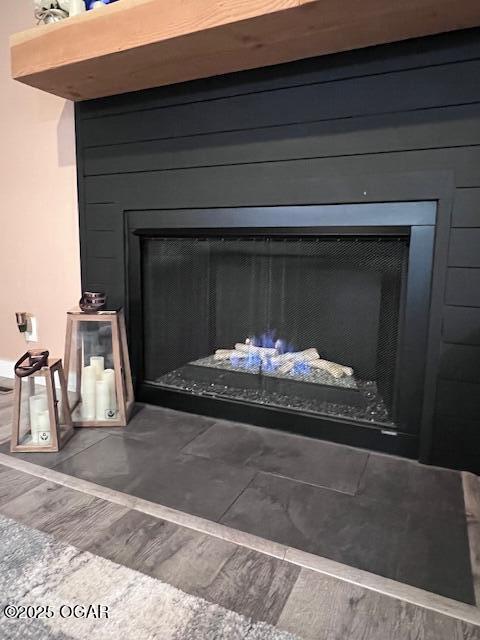 3331 Willow Ln, Joplin, MO 64801 - detailed view of a fireplace and wood finished floors