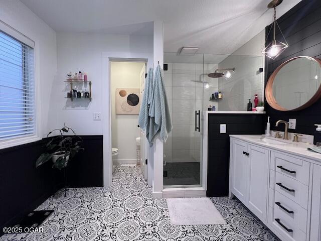 3331 Willow Ln, Joplin, MO 64801 - full bath with vanity, a stall shower, toilet, and tile patterned floors