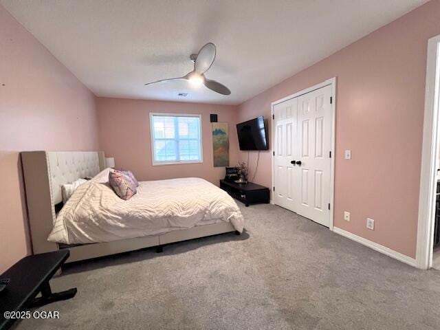 3331 Willow Ln, Joplin, MO 64801 - bedroom featuring carpet floors, baseboards, ceiling fan, and a closet