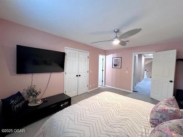 3331 Willow Ln, Joplin, MO 64801 - bedroom with light colored carpet, a closet, baseboards, and ceiling fan