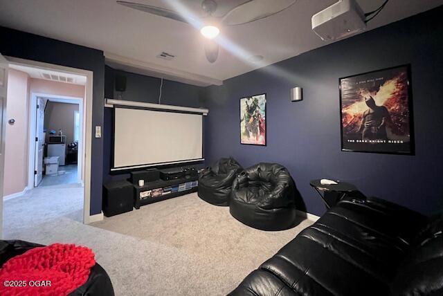 3331 Willow Ln, Joplin, MO 64801 - cinema room featuring carpet floors, a ceiling fan, and baseboards