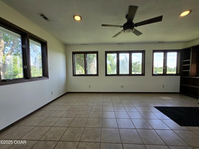 615 N Van Hoorebeke Rd, Joplin, MO 64801 - unfurnished room with recessed lighting, a ceiling fan, tile patterned flooring, and baseboards