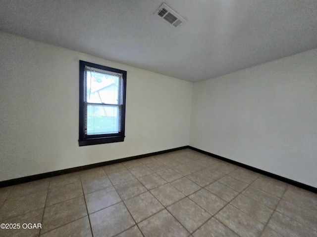 615 N Van Hoorebeke Rd, Joplin, MO 64801 - spare room featuring baseboards
