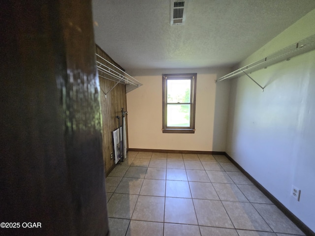 615 N Van Hoorebeke Rd, Joplin, MO 64801 - spacious closet with light tile patterned floors