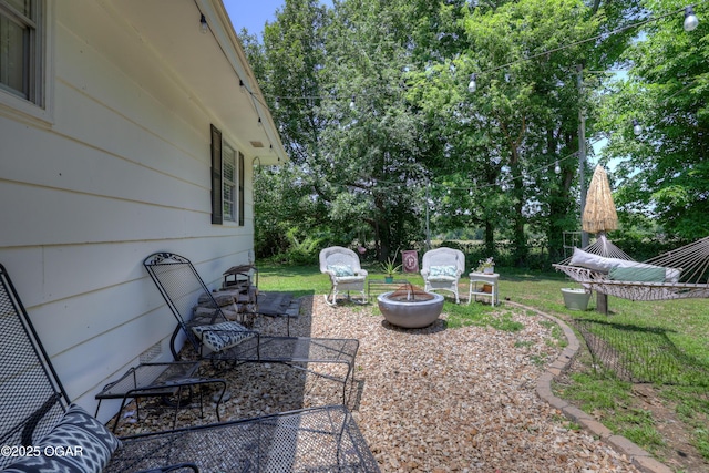 509 Brentwood Dr, Carl Junction, MO 64834 - view of yard with an outdoor fire pit and a patio area