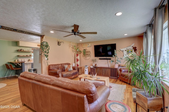 509 Brentwood Dr, Carl Junction, MO 64834 - living area featuring a textured ceiling, a ceiling fan, light wood-style floors, and recessed lighting