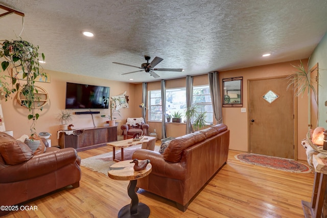 509 Brentwood Dr, Carl Junction, MO 64834 - living room featuring a textured ceiling, light wood-style floors, ceiling fan, and recessed lighting