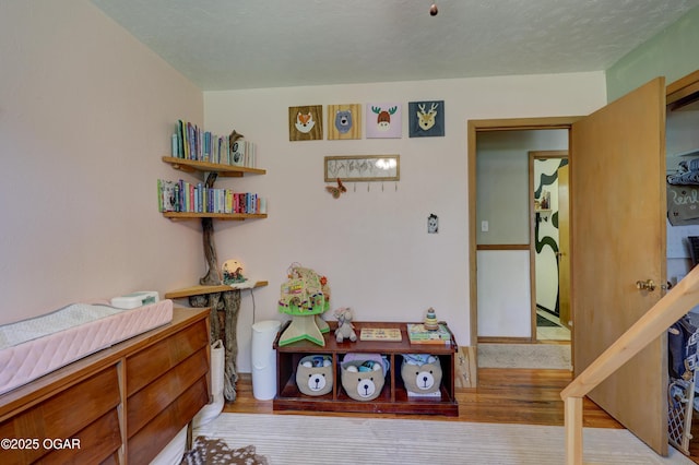 509 Brentwood Dr, Carl Junction, MO 64834 - bedroom featuring wood finished floors
