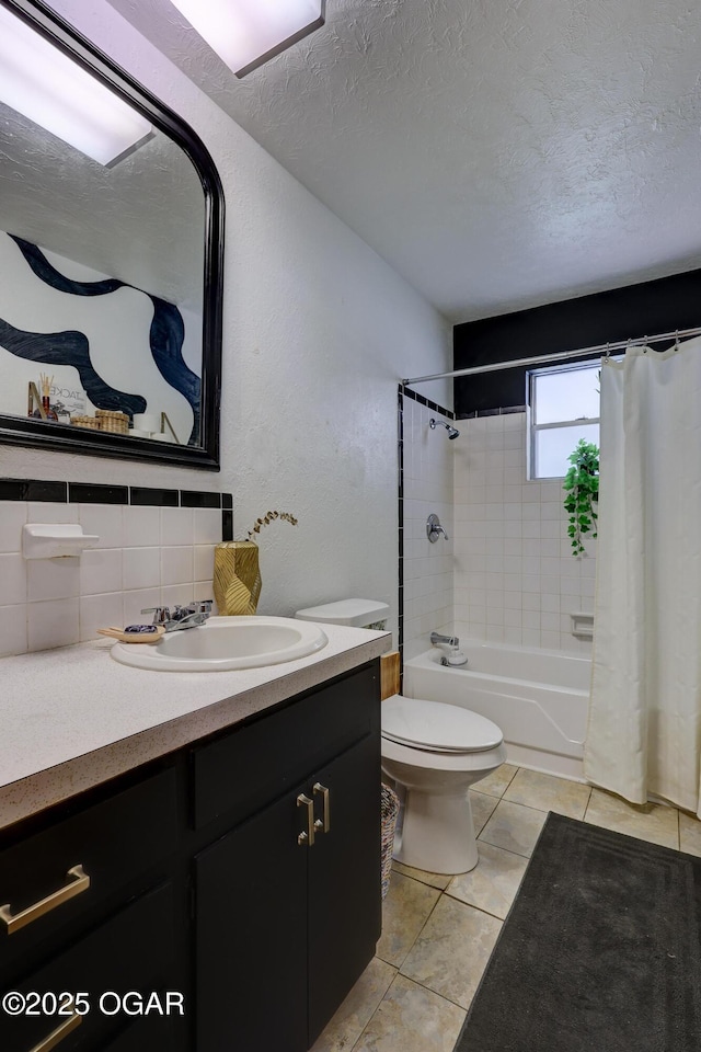 509 Brentwood Dr, Carl Junction, MO 64834 - full bath featuring vanity, shower / bath combination with curtain, tile patterned flooring, a textured ceiling, and backsplash