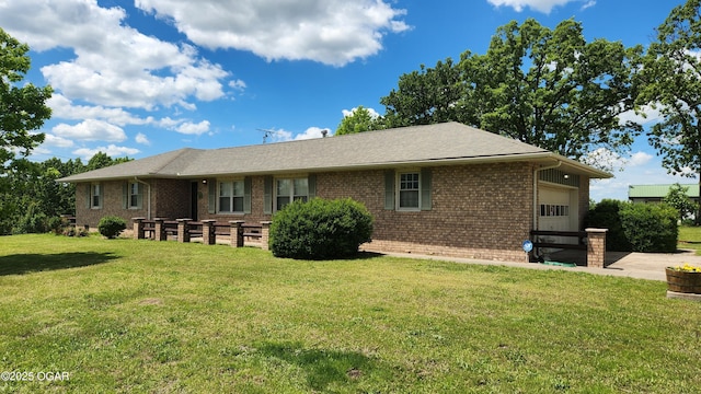 3002 S Main St, Galena, KS 66739 - single story home featuring brick siding, an attached garage, a front yard, and driveway