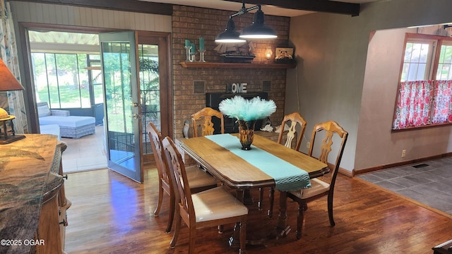 3002 S Main St, Galena, KS 66739 - dining area featuring wood finished floors and beamed ceiling