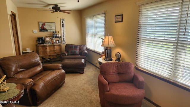 3002 S Main St, Galena, KS 66739 - carpeted living area with a ceiling fan and baseboards
