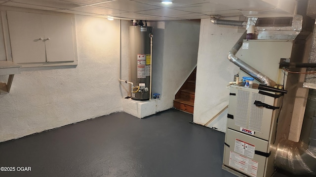 3002 S Main St, Galena, KS 66739 - unfinished below grade area with water heater and a textured wall
