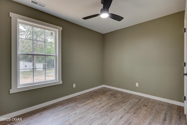 26204 King Ln, Carl Junction, MO 64834 - empty room featuring wood finished floors and ceiling fan