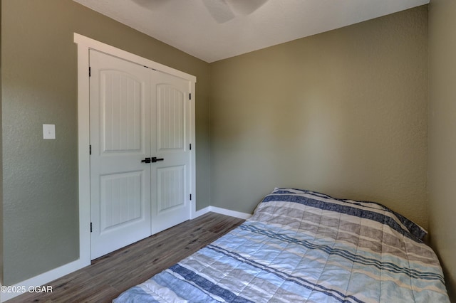 26204 King Ln, Carl Junction, MO 64834 - bedroom featuring wood finished floors, a closet, and a ceiling fan