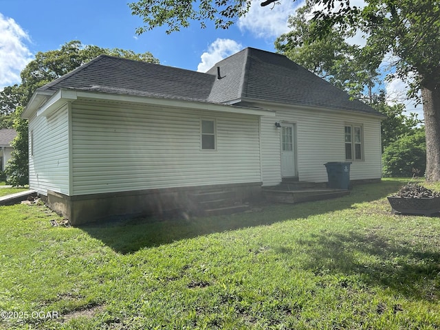 507 W Hill St, Neosho, MO 64850 - back of house with a yard and a shingled roof