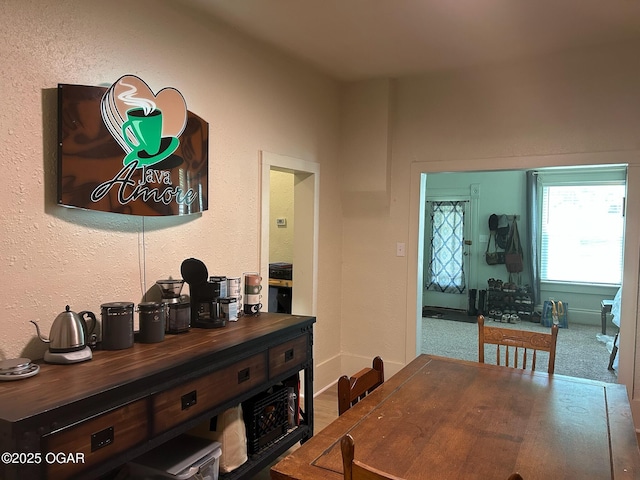 507 W Hill St, Neosho, MO 64850 - dining space with a textured wall