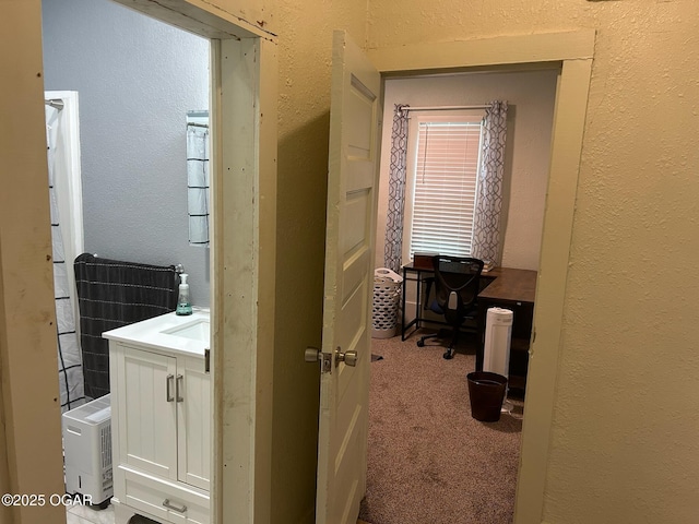 507 W Hill St, Neosho, MO 64850 - office with carpet floors and a textured wall