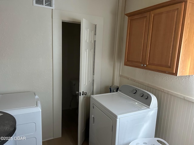 507 W Hill St, Neosho, MO 64850 - laundry room featuring cabinet space and washer and dryer