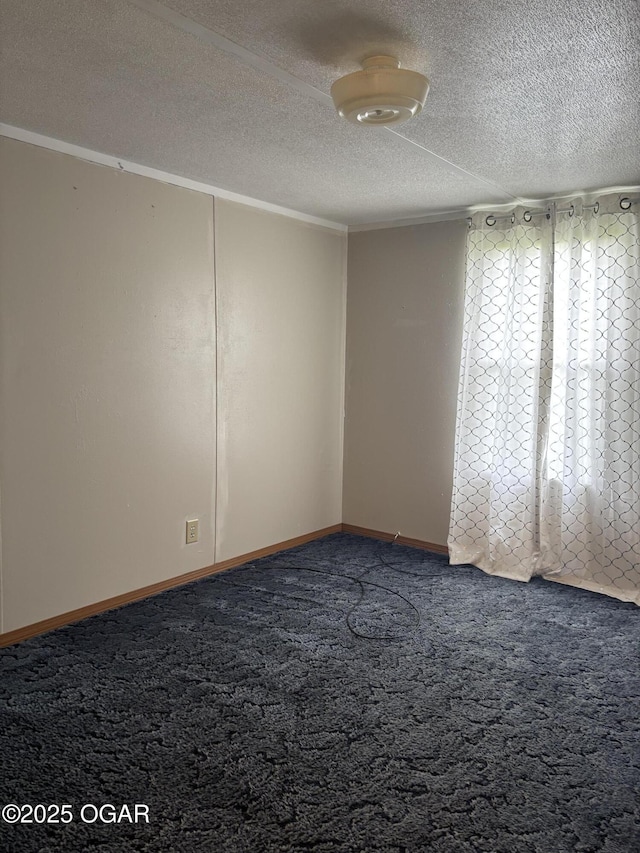 1346 SE Gum Ln, Baxter Springs, KS 66713 - carpeted spare room with a textured ceiling and crown molding