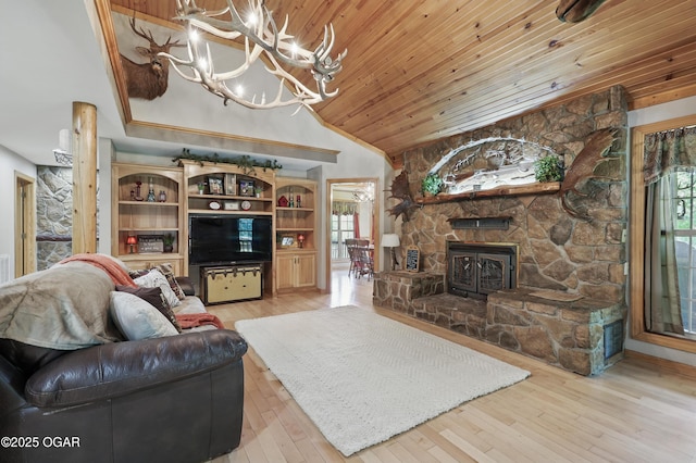9404 County Lane 121, Carthage, MO 64836 - living area with lofted ceiling, wood ceiling, healthy amount of natural light, a chandelier, and light wood-style floors