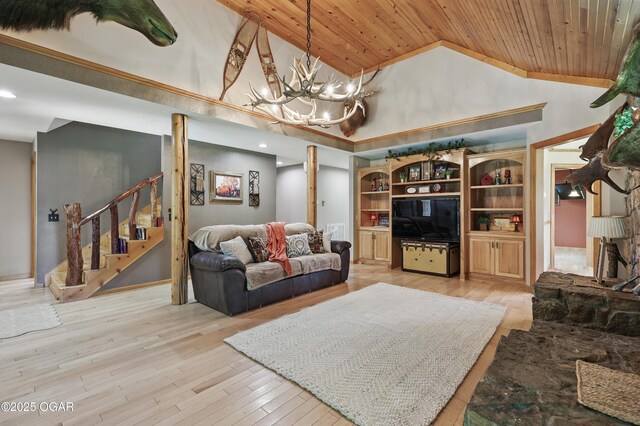 9404 County Lane 121, Carthage, MO 64836 - living room featuring wooden ceiling, stairs, a chandelier, light wood-type flooring, and high vaulted ceiling