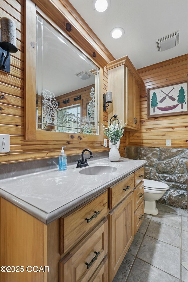 9404 County Lane 121, Carthage, MO 64836 - bathroom with vanity and wooden walls