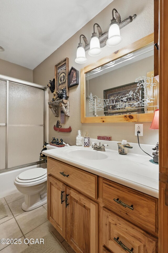 9404 County Lane 121, Carthage, MO 64836 - bathroom featuring vanity, tile patterned flooring, and bath / shower combo with glass door