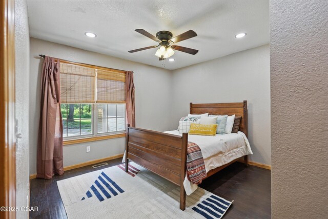 9404 County Lane 121, Carthage, MO 64836 - bedroom with wood finished floors, recessed lighting, ceiling fan, and a textured wall