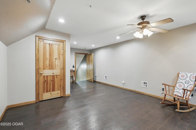 9404 County Lane 121, Carthage, MO 64836 - unfurnished room with dark wood-style flooring, a ceiling fan, vaulted ceiling, and recessed lighting
