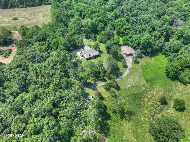9404 County Lane 121, Carthage, MO 64836 - aerial view of property and surrounding area with a forest