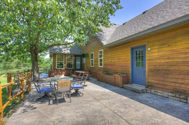 9404 County Lane 121, Carthage, MO 64836 - view of patio / terrace featuring outdoor dining area and an outdoor structure