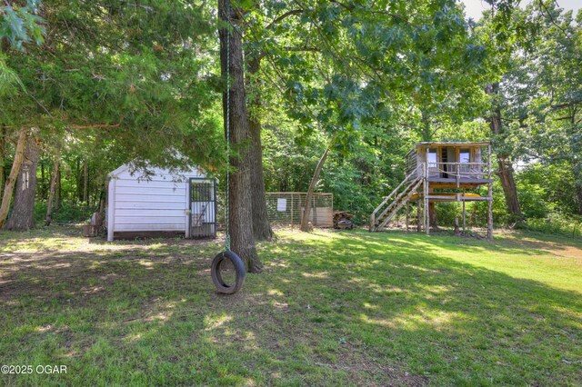 9404 County Lane 121, Carthage, MO 64836 - view of yard with a storage unit and stairs