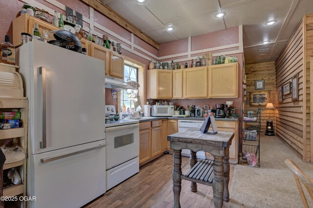 9404 County Lane 121, Carthage, MO 64836 - kitchen featuring white appliances, light brown cabinetry, recessed lighting, under cabinet range hood, and light wood-type flooring