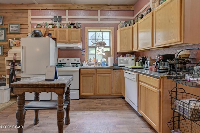 9404 County Lane 121, Carthage, MO 64836 - kitchen with white appliances, exhaust hood, light wood-type flooring, dark countertops, and light brown cabinets