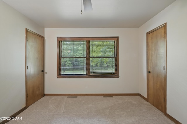 5694 Spurgeon Rd, Joplin, MO 64804 - spare room featuring carpet flooring and baseboards