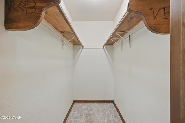 5694 Spurgeon Rd, Joplin, MO 64804 - walk in closet featuring carpet flooring
