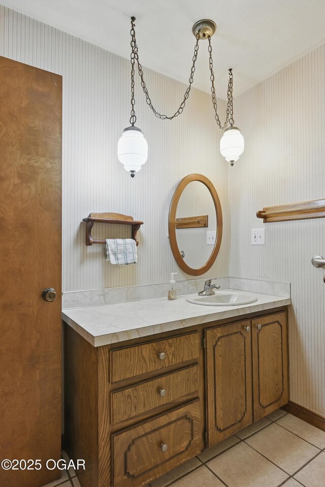 5694 Spurgeon Rd, Joplin, MO 64804 - bathroom featuring vanity, tile patterned flooring, and wallpapered walls