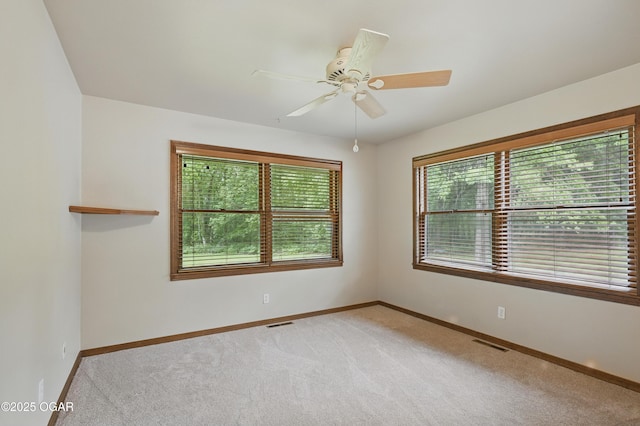 5694 Spurgeon Rd, Joplin, MO 64804 - spare room with light carpet and a ceiling fan