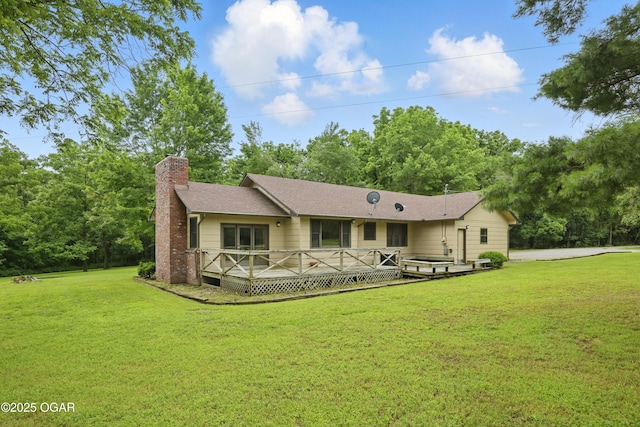 5694 Spurgeon Rd, Joplin, MO 64804 - ranch-style home featuring a chimney, a front lawn, and a wooden deck
