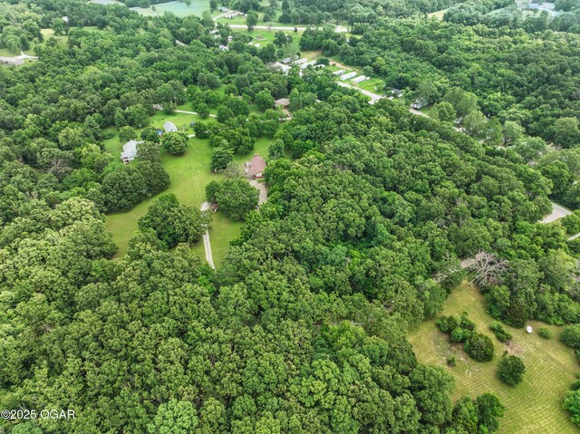 5694 Spurgeon Rd, Joplin, MO 64804 - aerial view of property and surrounding area with a forest