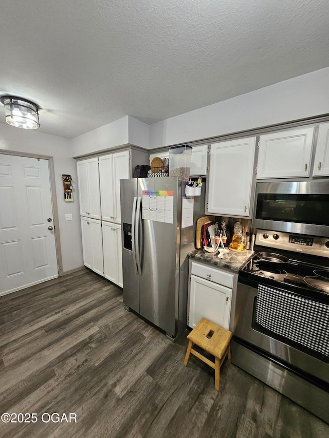 5358 Lawrence Unit 2220, Pierce City, MO 65723 - kitchen with appliances with stainless steel finishes, dark wood-type flooring, and white cabinets