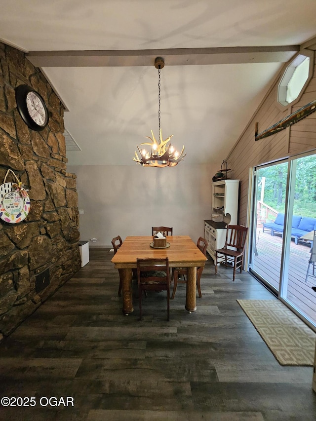 5358 Lawrence Unit 2220, Pierce City, MO 65723 - dining space featuring a chandelier, dark wood-type flooring, and wooden walls