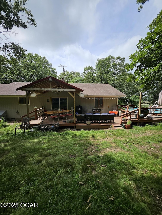 5358 Lawrence Unit 2220, Pierce City, MO 65723 - rear view of property with a lawn and a wooden deck